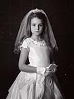 A fab little subject posing in her First Holy Communion dress at our studio, in Limerick.  