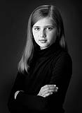 Portrait of beautiful young girl in classic timeless style.  