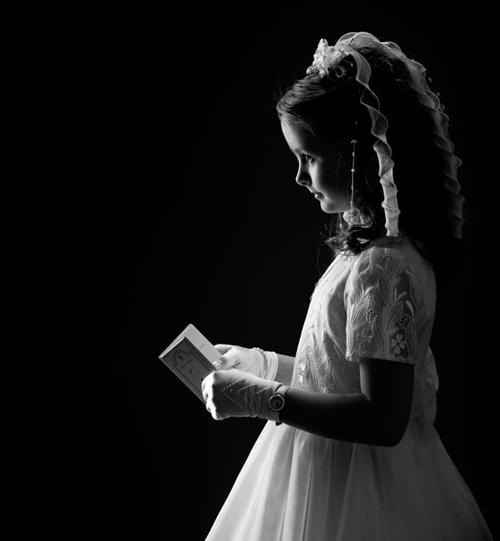 First Holy Communion portrait of little girl at Cormac Byrne Photography, Dooradoyle, Limerick  