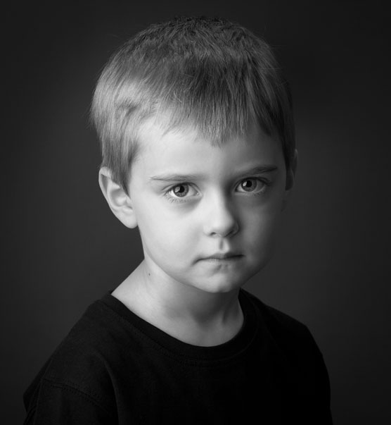 Classic black and white portrait of young boy at Cormac Byrne Photography, Limerick, Ireland.  