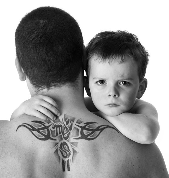 Father and son black and white portrait taken in studio at Cormac Byrne Photography  